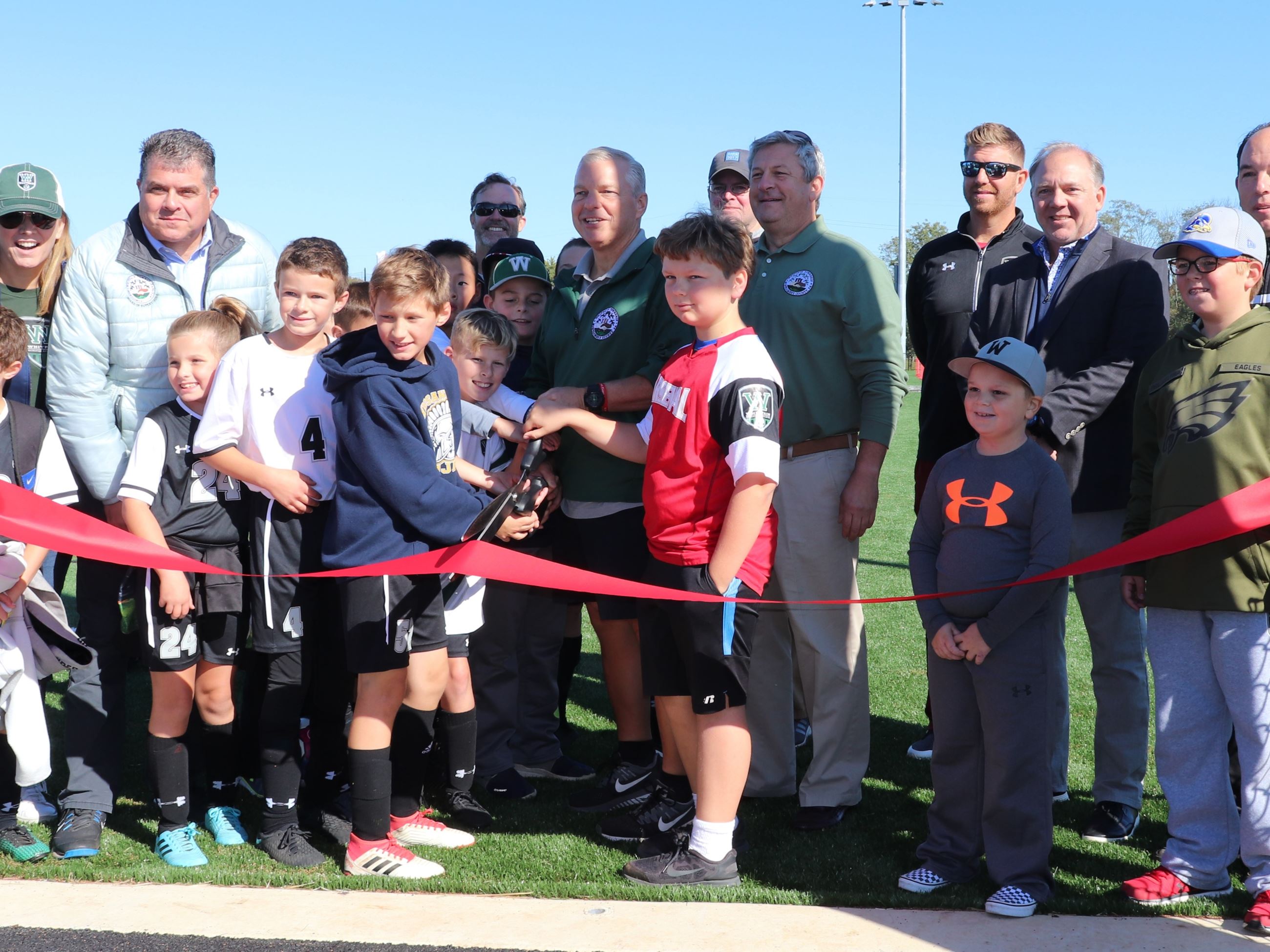 Cropped Ribbn Cutting Photo for Wire